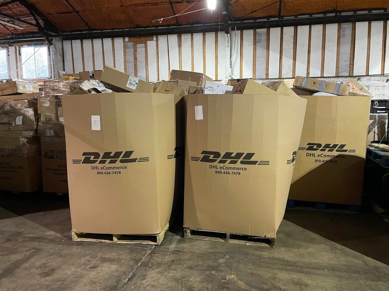 DHL Undeliverable Mail Pallet: 300+ Sealed Mystery Parcels